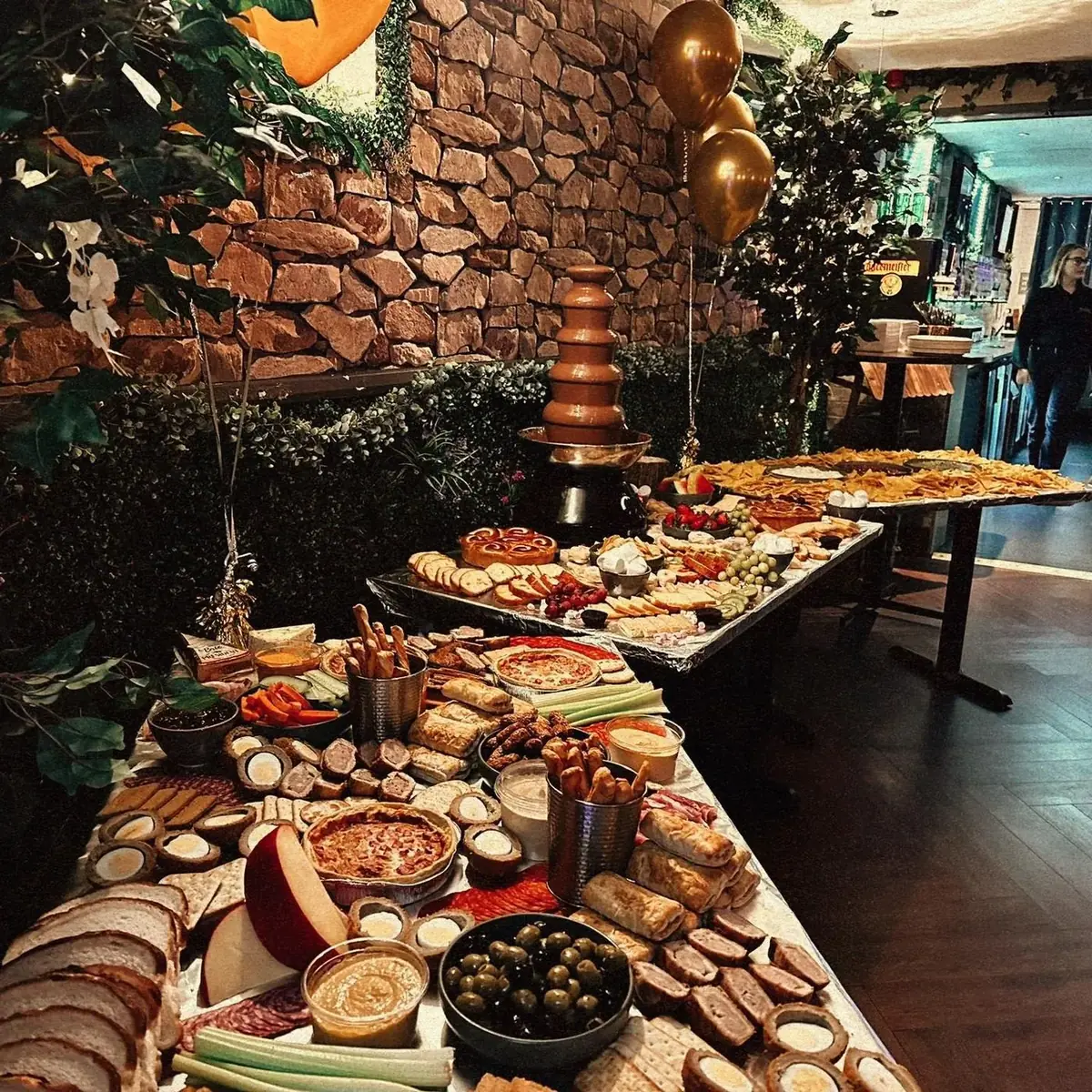 Long sharing table with chocolate fountain and dippers