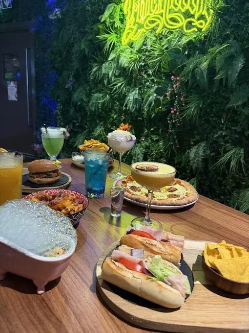 Brunch boards and colourful drinks on a table